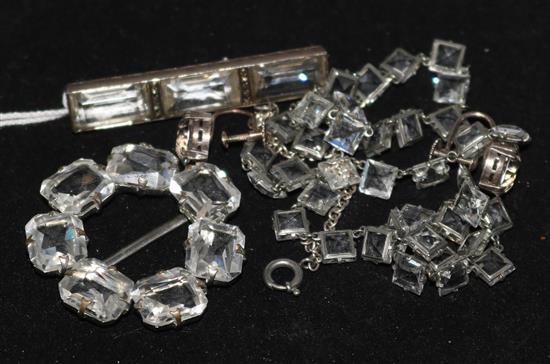 A 935 standard silver & rock crystal brooch, a pair of earrings, a brooch and necklace.